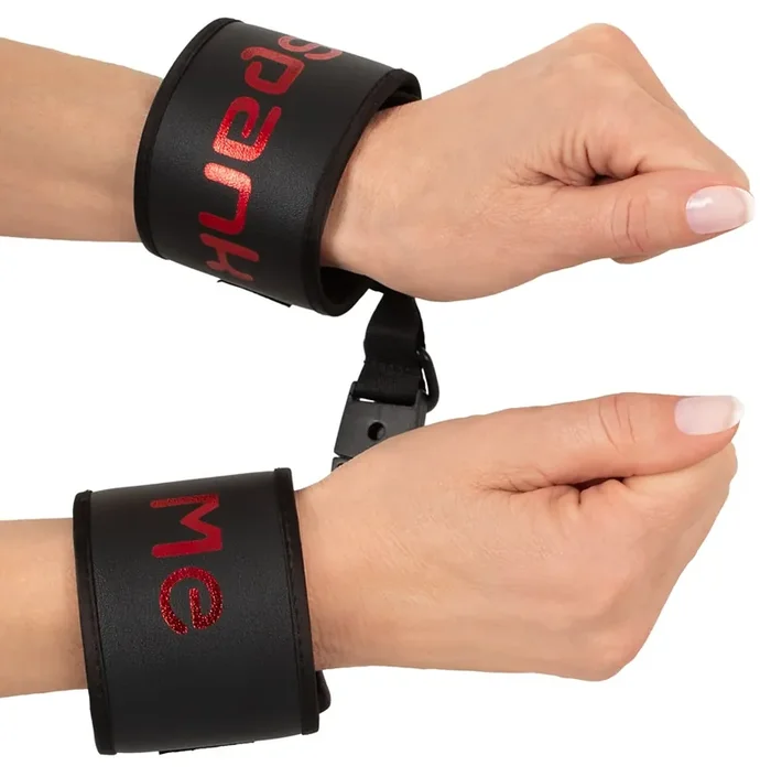 Spank me Cuffs schwarz/rot